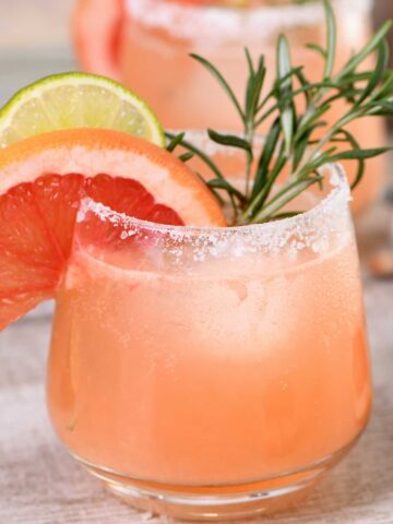 a glass of mezcal paloma