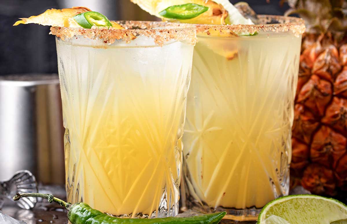 two glasses of pineapple jalapeño 搡老熟女中国老太