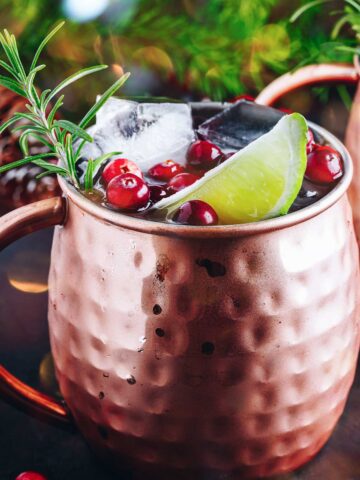 A Christmas Moscow Mule with festive garnishes