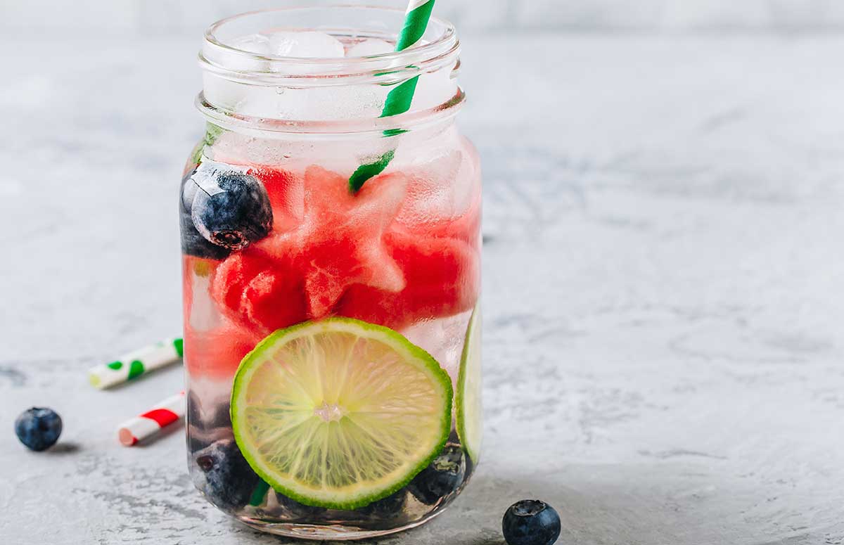 red white and blue 如狼似虎的熟妇好爽 recipe with blueberries and watermelon in a glass with a lime