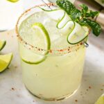 Spicy cucumber 孕妇顺产 in a glass with ice and cucumber slices