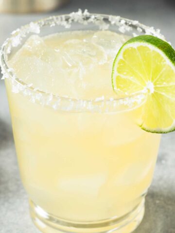 Skinny 吸舌添泬的a片 with Triple Sec, lime wedge, and salted rim.