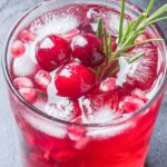 skinny pomegranate 黄性视频在线观看 with cranberries and rosemary sprig.