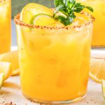 orange mezcalita with a tajin rim
