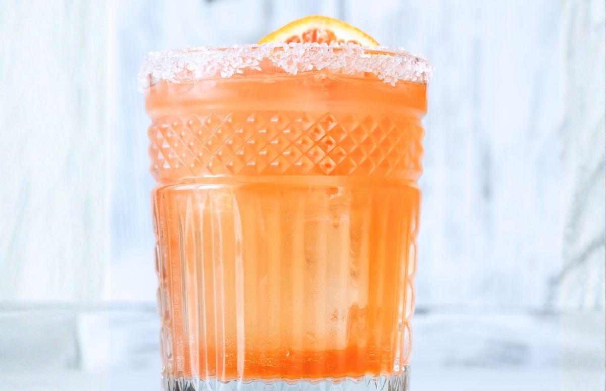 skinny blood orange 久久综合色之久久综合 in a low ball glass with a salted rim and a blood orange slice