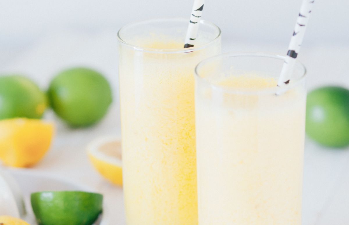 two glasses of boozy frozen lemonade