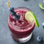 frozen blueberry 推油少妇久久99久久99久久 in a glass