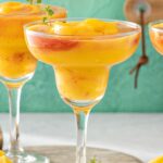 a frozen mango chili 婷婷网站 in front of a teal wall