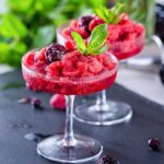 two frozen berry 色欲欲www成人网站 garnished with mint leaves