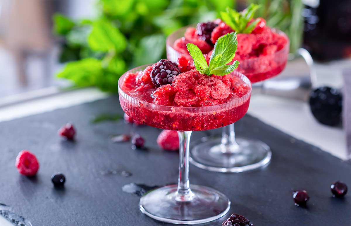two frozen berry 色欲欲www成人网站 garnished with mint leaves