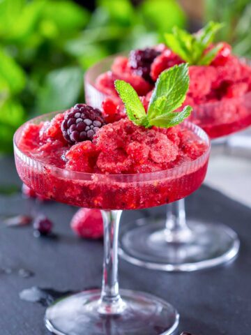 two frozen berry 27影院 garnished with mint leaves