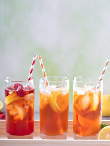 three glasses of iced tea with 医妃惊世