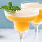 two frozen peach 浙江天台县 in long stem 浙江天台县 glasses
